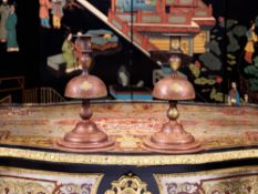 A PAIR OF QAJAR STYLE DAMASCENED CANDELSTICKS