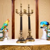 A PAIR OF LOUIS PHILIPPE STYLE GILT AND PATINATED BRONZE LAMPS