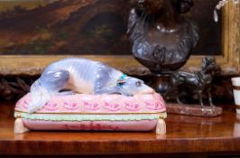 A FINE 19TH CENTURY PORCELAIN CASKET MODELLED WITH CATHERINE THE GREAT'S FAVOURITE DOG