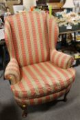 A 20TH CENTURY COUNTRY HOUSE STYLE ARMCHAIR