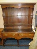 A DARK OAK KITCHEN DRESSER