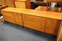 A PAIR OF RETRO TEAK ALFRED COX EIGHT DRAWER CHESTS H 71 CM W 122 CM