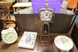 FOUR MODERN ASSORTED CLOCKS