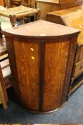 AN ANTIQUE OAK HANGING CORNER CUPBOARD