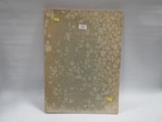 A LARGE VINTAGE BOOK TITLED 