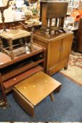 A VINTAGE OAK CABINET, TWO TABLES,. STOOL & TROLLEY