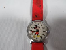 A VINTAGE DISNEY MICKEY MOUSE WRIST WATCH