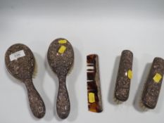 A SELECTION OF HALLMARKED SILVER BACK BRUSHES WITH A COMB