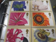 THREE FOLDERS OF MODERN STAMP RELATED POST CARDS