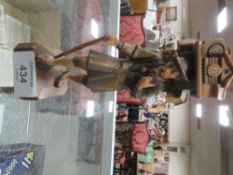 A VINTAGE HAND CARVED WOODEN CLOCK - MON HALION ARNI