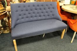 A MODERN BLUE UPHOLSTERED BENCH SETTEE - W 134 CM
