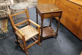 A VINTAGE OAK BARLEYTWIST STAND AND A CHILDS ROCKING CHAIR (2)
