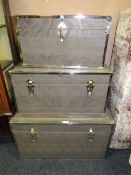 A SET OF THREE MODERN GRADUATED STORAGE CASES