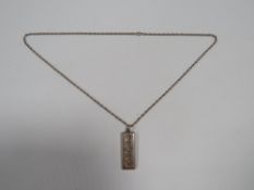 A MENS VINTAGE 1oz SILVER INGOT ON A SILVER CHAIN