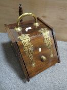 A BRASS BOUND WOODEN COAL SCUTTLE