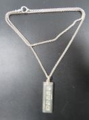 A MENS VINTAGE 1oz SILVER INGOT ON A SILVER CHAIN