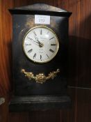 A DECORATIVE QUARTZ MANTLE CLOCK