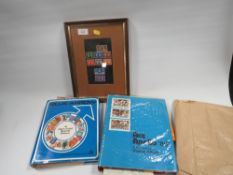 A SMALL STAMP COLLECTION TO INCLUDE FRAMED EXAMPLES