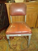 A MODERN INDUSTRIAL STYLE METAL / LEATHER CHAIR