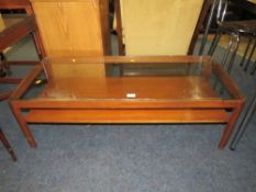 A RETRO TEAK AND GLASS COFFEE TABLE