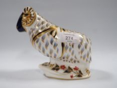 A ROYAL CROWN DERBY PAPER WEIGHT IN THE FORM OF A RAM