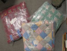 A SELECTION OF HAND SEWN QUILTS