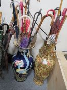 TWO LARGE CERAMIC VASES CONTAINING A COLLECTION OF VINTAGE PARASOLS