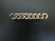 A 9C GOLD CHAIN LINK BROOCH WITH BASE METAL PIN approx weight 3.5g