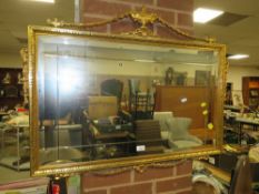A MODERN GILT FRAMED WALL MIRROR - W 98 cm