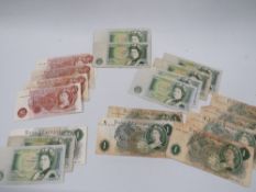 A WALLET OF TEN SHILLING & ONE POUND NOTES