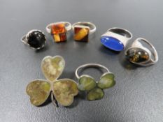 A SILVER HARD STONE CLOVER BROOCH TOGETHER WITH A MATCHING RING AND FIVE DRESS RINGS