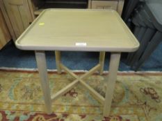 A MODERN SMALL LAMP TABLE