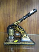 A CAST IRON PAPER STAMP FOR IRELANDS GARAGE LIMITED