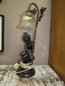 A MODERN RESIN FIGURAL TABLE LAMP