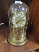 A KUNDO PLASTIC DOME CLOCK