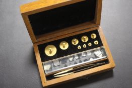 A BOXED MINIATURE WEIGHTS SET