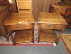 A PAIR OF OAK LAMP TABLES WITH A SINGLE DRAWER (2)