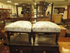 A PAIR OF EDWARDIAN MAHOGANY NURSING CHAIRS