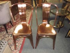A PAIR OF INDUSTRIAL STYLE METAL CHAIRS
