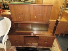 A MID CENTURY MAHOGANY MODULAR STYLE BOOKCASE