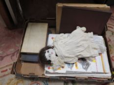 A TRAY OF SUNDRIES TO INCLUDE A PORCELAIN HEAD MUSICAL DOLL , BOOKS , MAGAZINES ETC