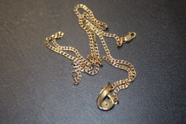 A HALLMARKED 9 CARAT GOLD PENDANT ON A HALLMARKED 9 CARAT GOLD CHAIN approx combined weight 5.4g