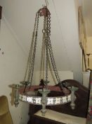 AN ANTIQUE ARTS AND CRAFTS PAINTED IRON AND BRASS PUGIN STYLE CHANDELIER