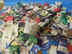 A BOX OF ASSORTED WALKING STICK BADGES