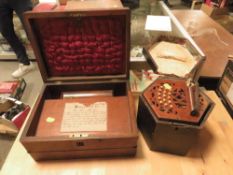 A CASED STEEL REEDS ACCORDION/SQUEEZE BOX TOGETHER WITH AN INLAID WRITING SLOPE DATED 1889