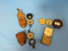 FOUR VINTAGE CASED COMPASSES