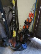 TWO SETS OF SKIS AND A PAIR OF SKI BOOTS