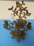 AN ORMOLU TWO LIGHT CANDELABRA WITH CENTRAL FIGURE OF A TURK