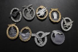 A QUANTITY OF GERMAN MILITARY TYPE BADGES