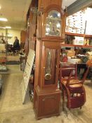 A MODERN TRIPLE WEIGHT LONGCASE CLOCK WITH MOON ROLLER